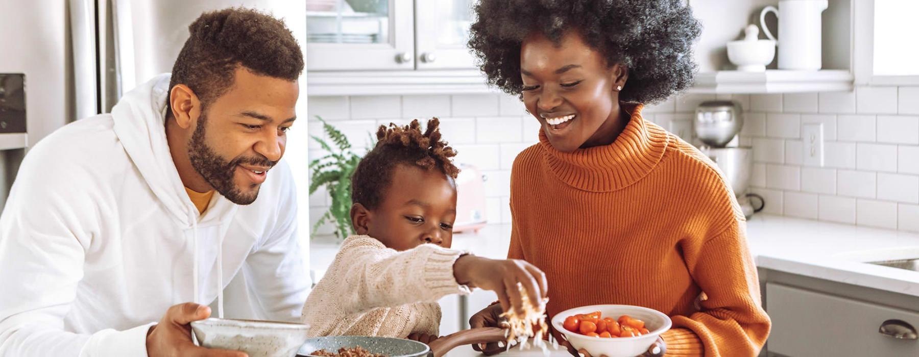 a family cooking together