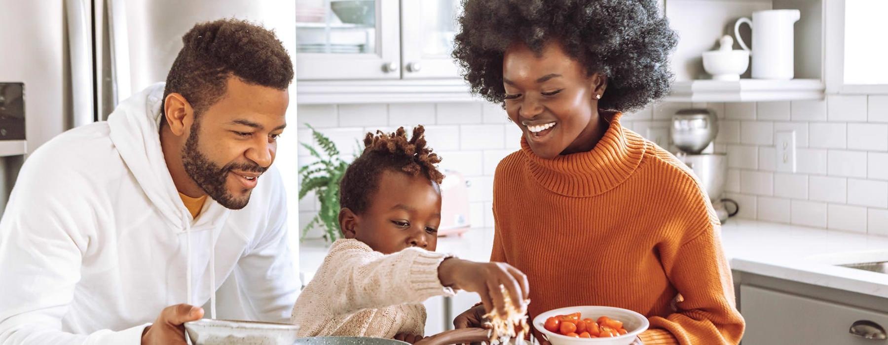 a family cooking together